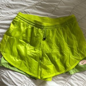Lime Green Nike shorts with built in bike shorts. Size M, NWT